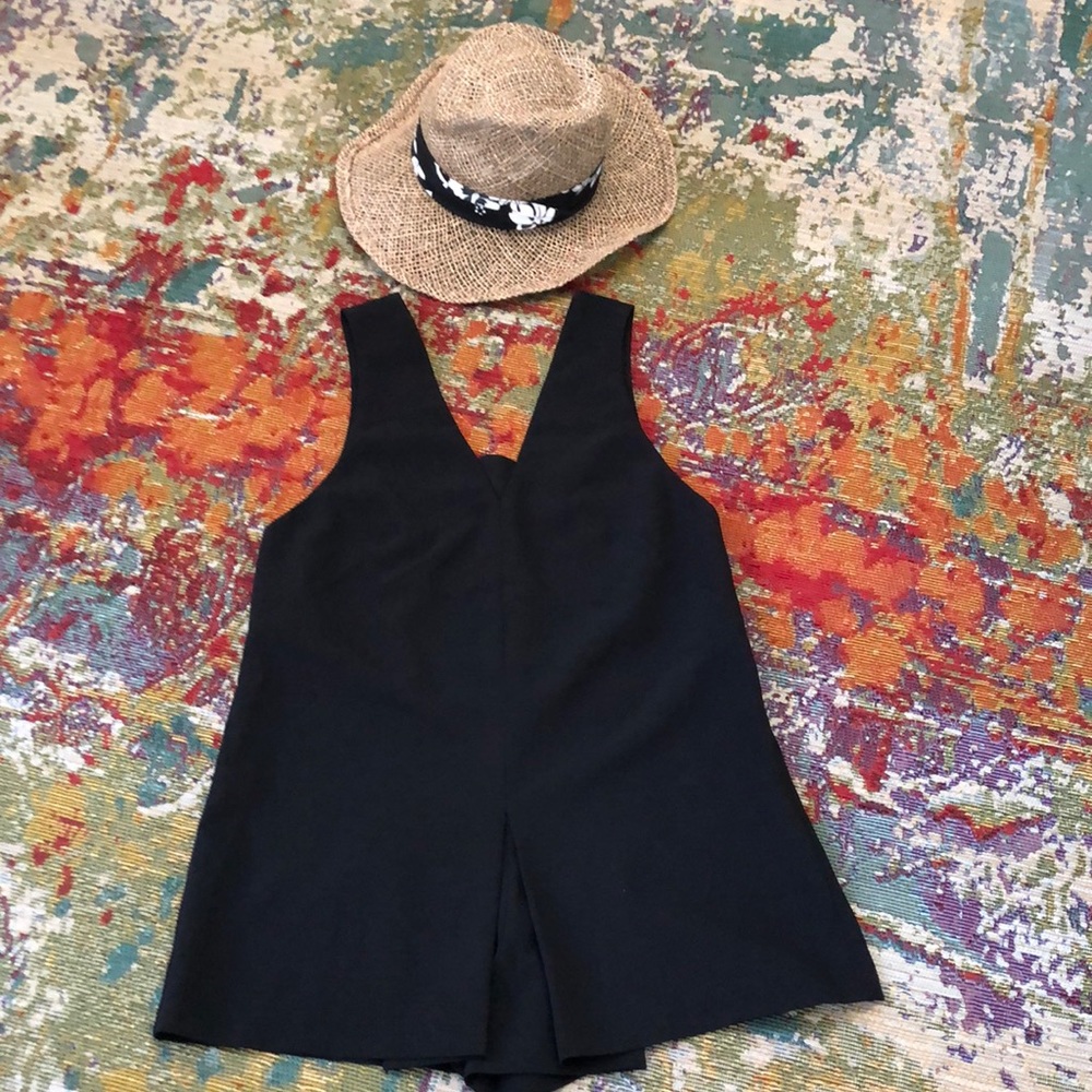 Black “C/MEO Collective” Romper.